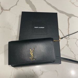 Saint Laurent phone clutch/small bag. Fits phone, key and a few cards.